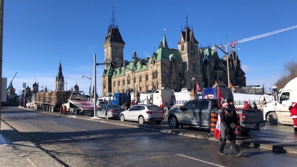 Protesters park truck convoy outside parliament hill in Ottawa