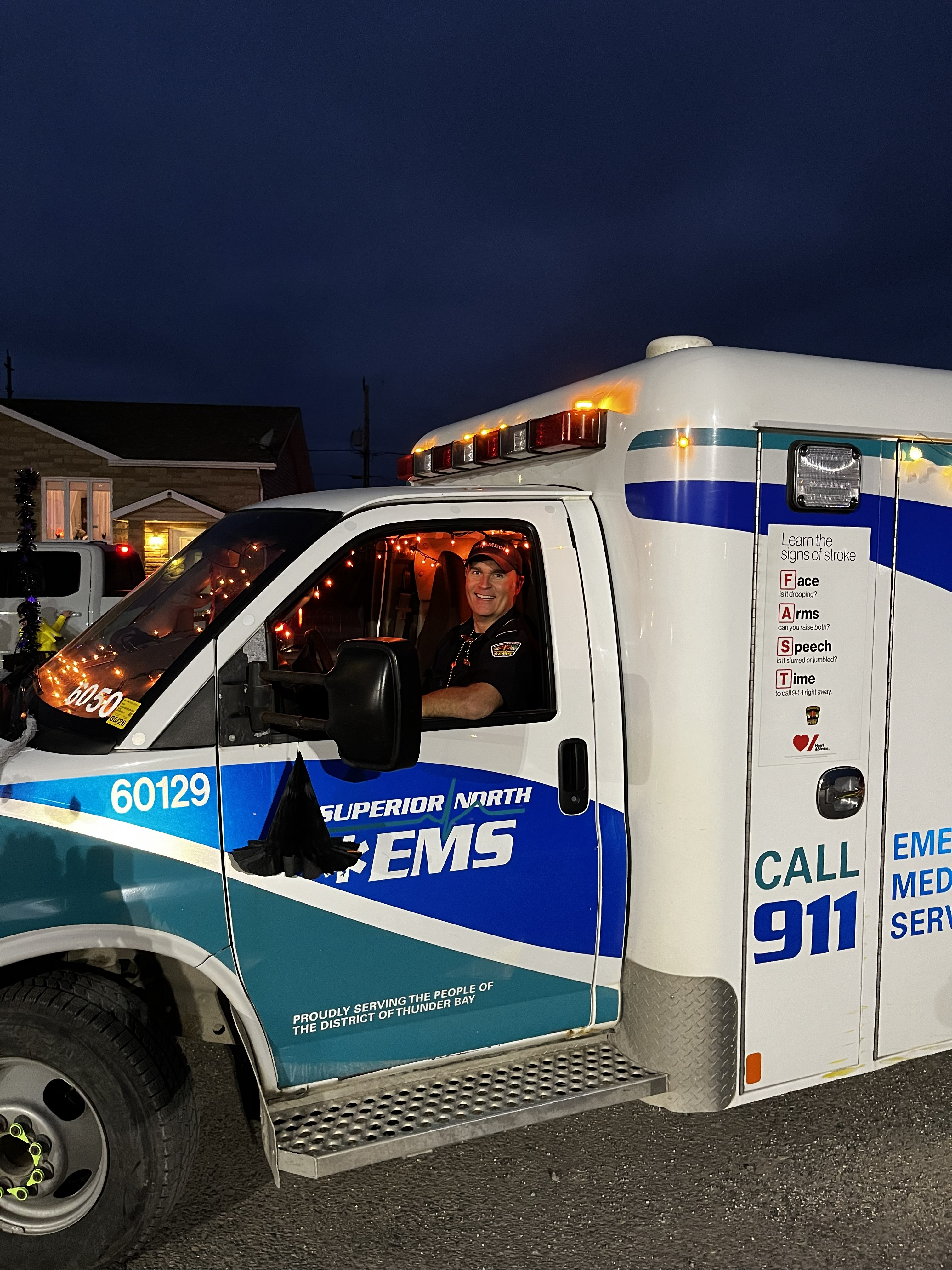 A Paramedic sitting in an ambulance