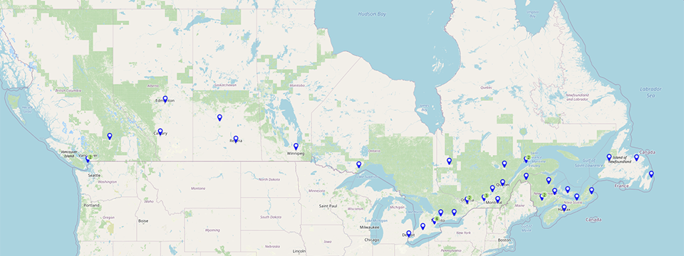Croppped map of Canada with blue markers on dozens of cities.