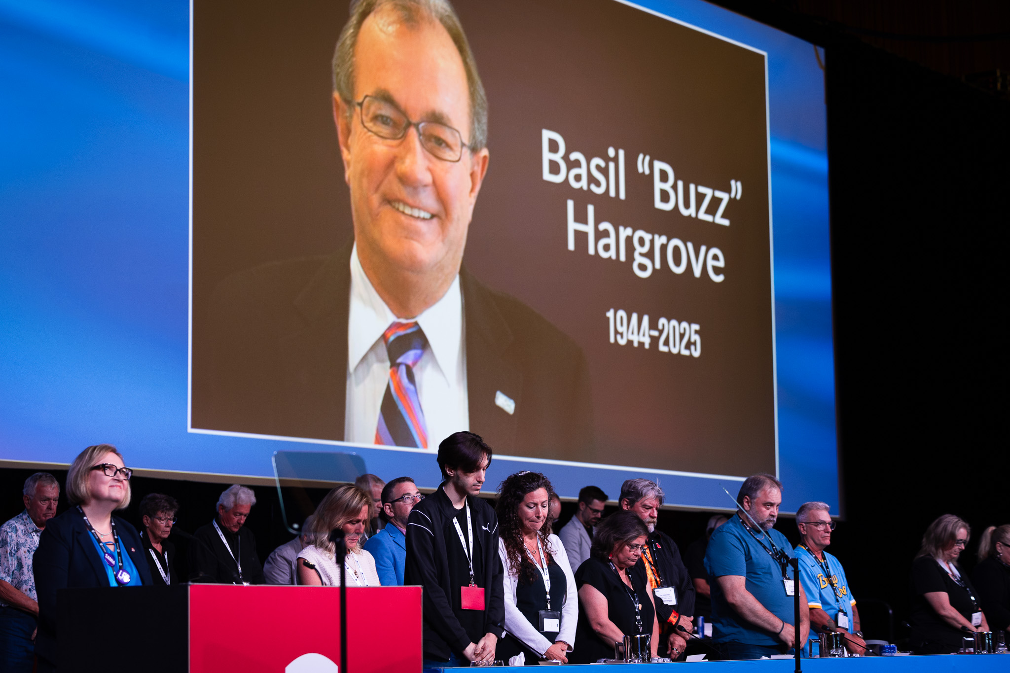 Buzz Hargrove 1944-2025 on a large screen 