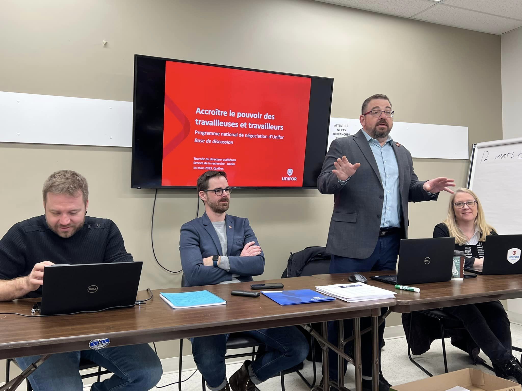 Daniel Cloutier speaks to members.