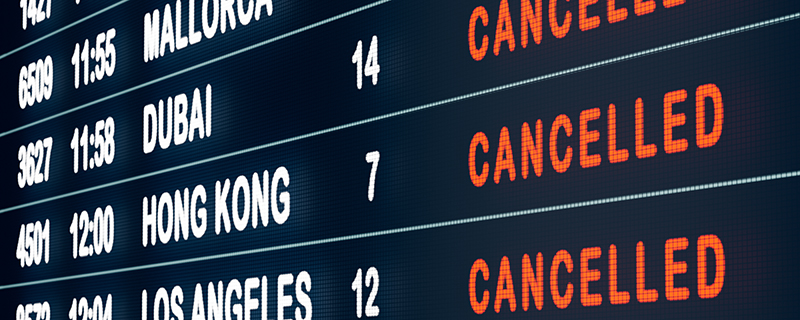 Airport screen showing cancelled flights