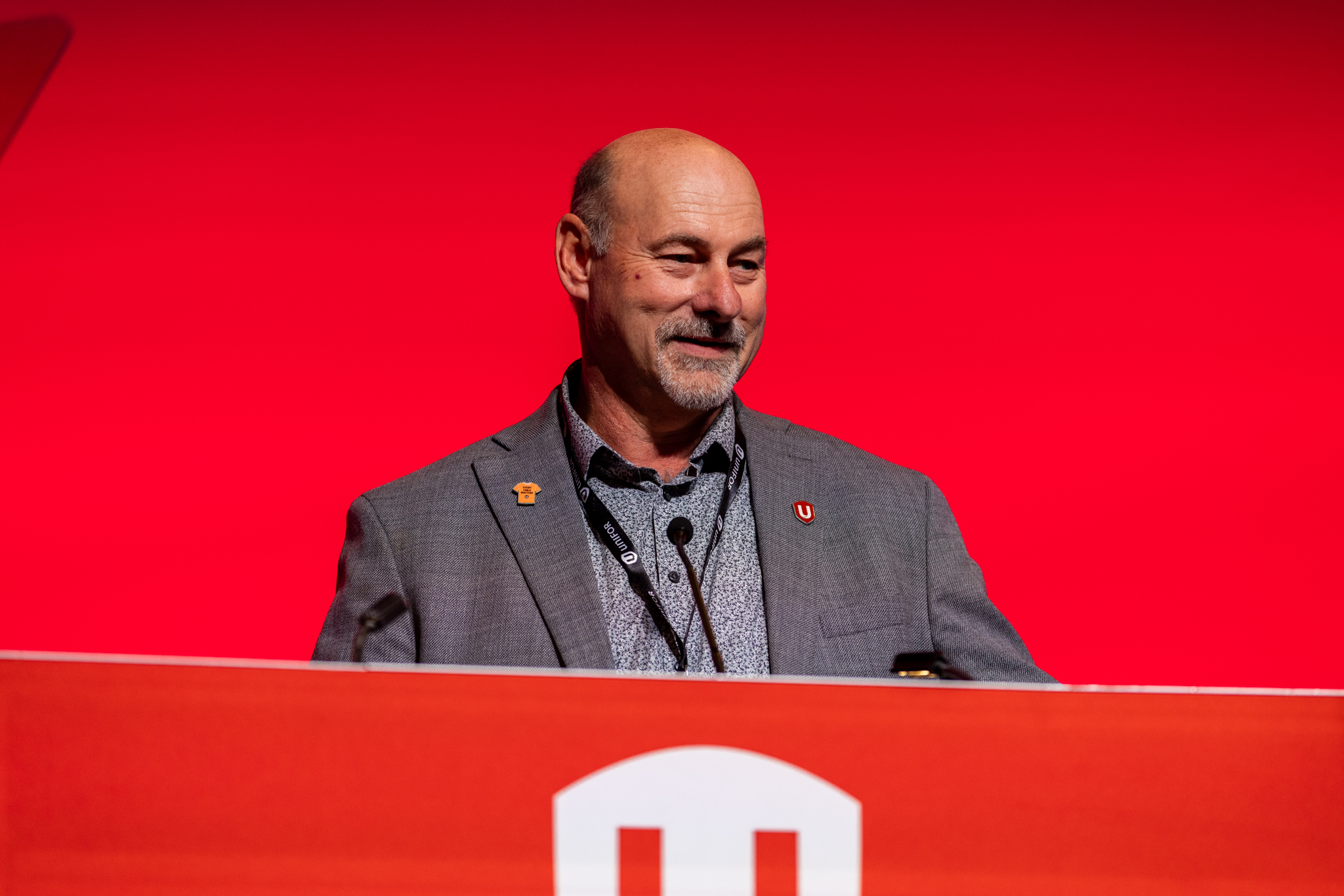 Len Poirier speaking at the podium at Canadian Council