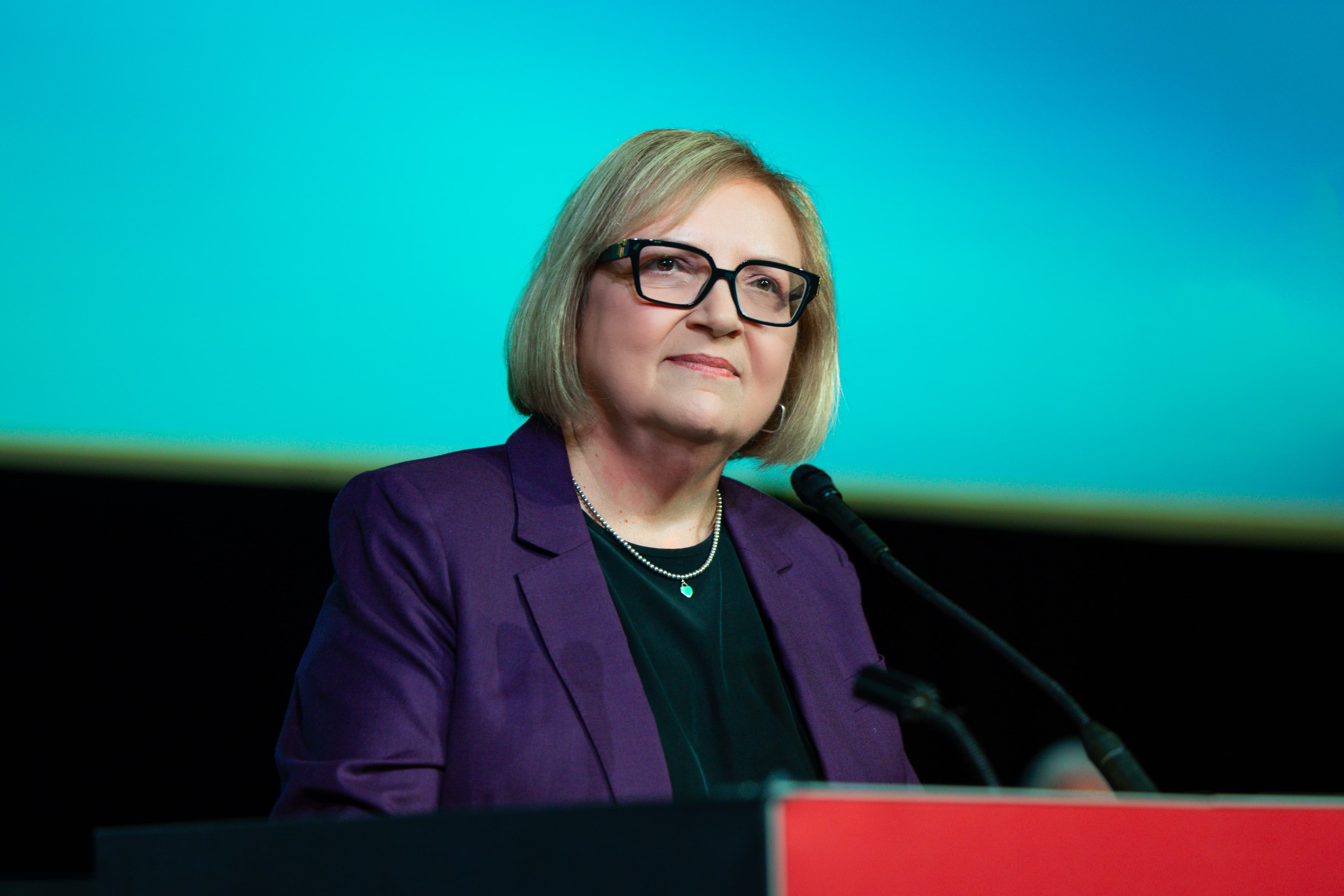 A women at a podium
