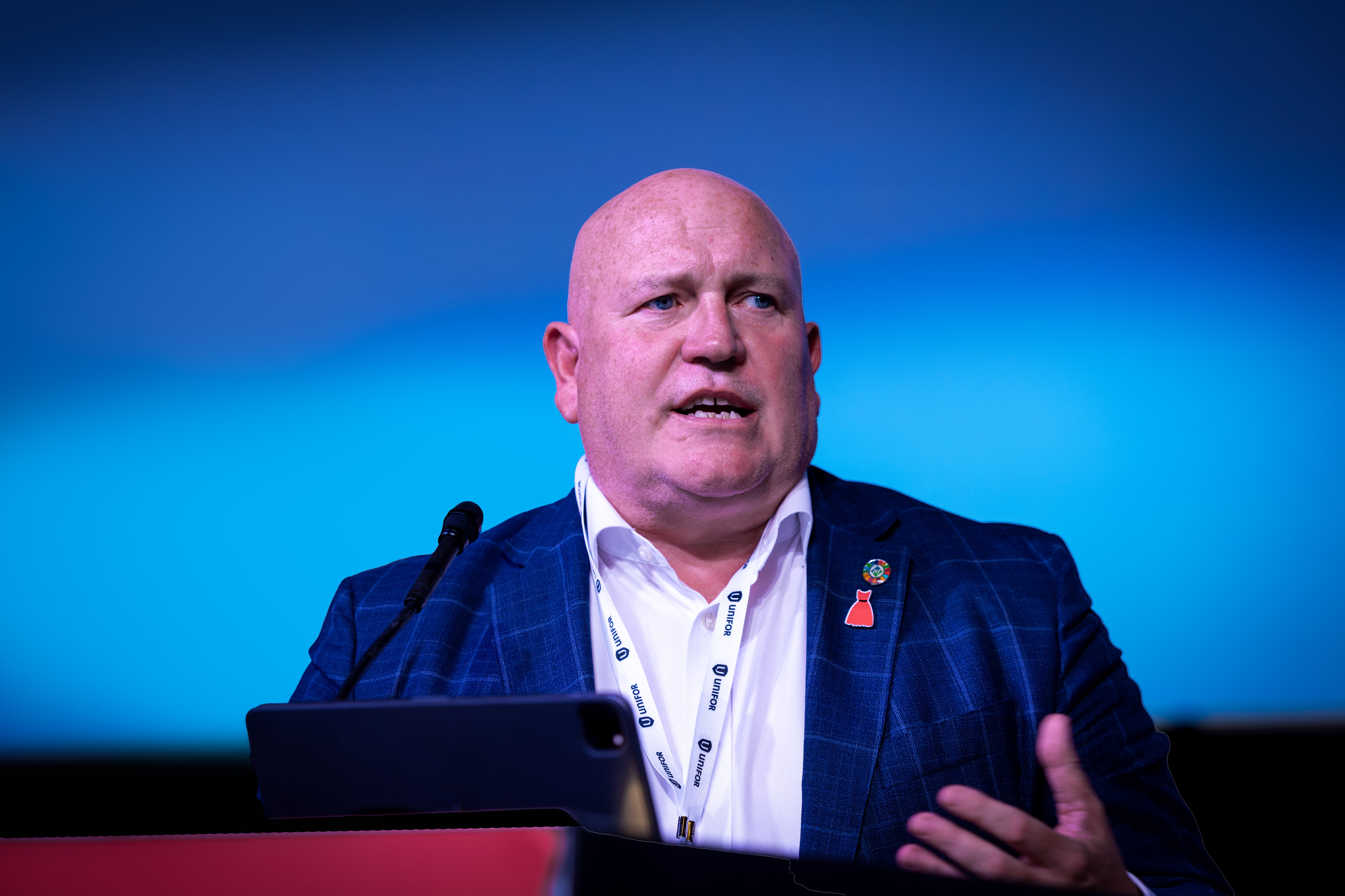 Man at a podium speaking