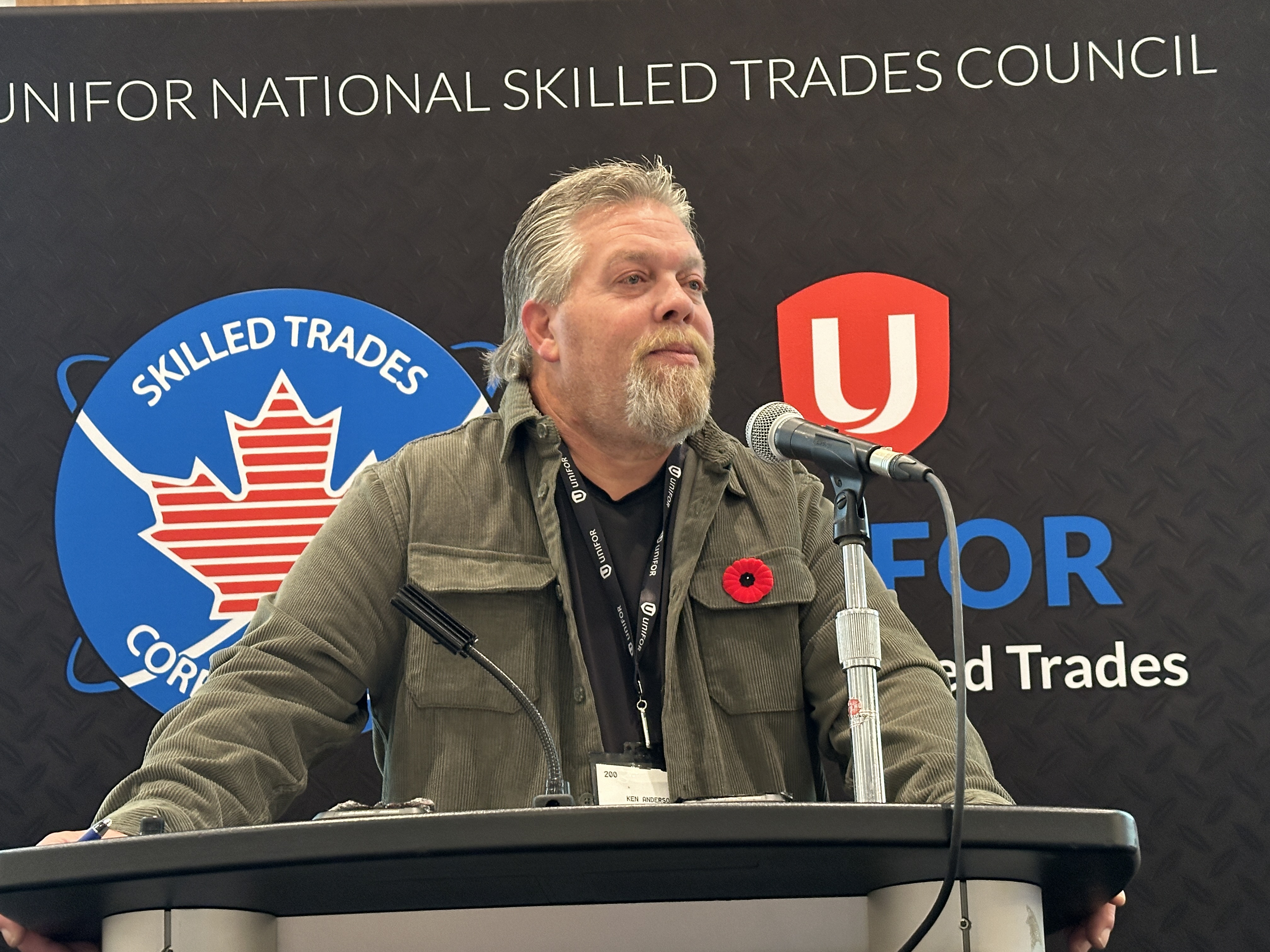 A man speaking into a mic