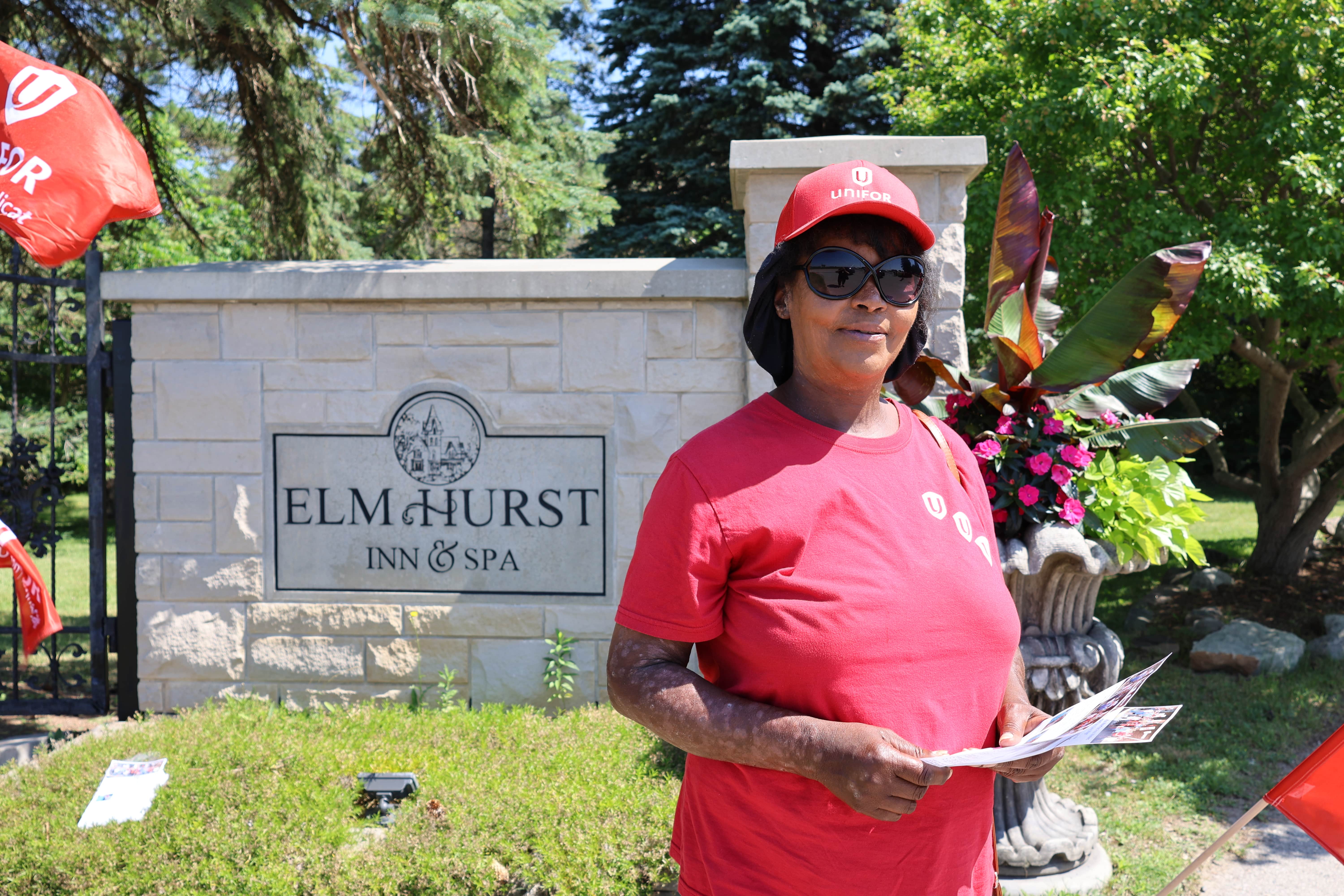woman standing outside Elm Hurst Inn &amp; Spa