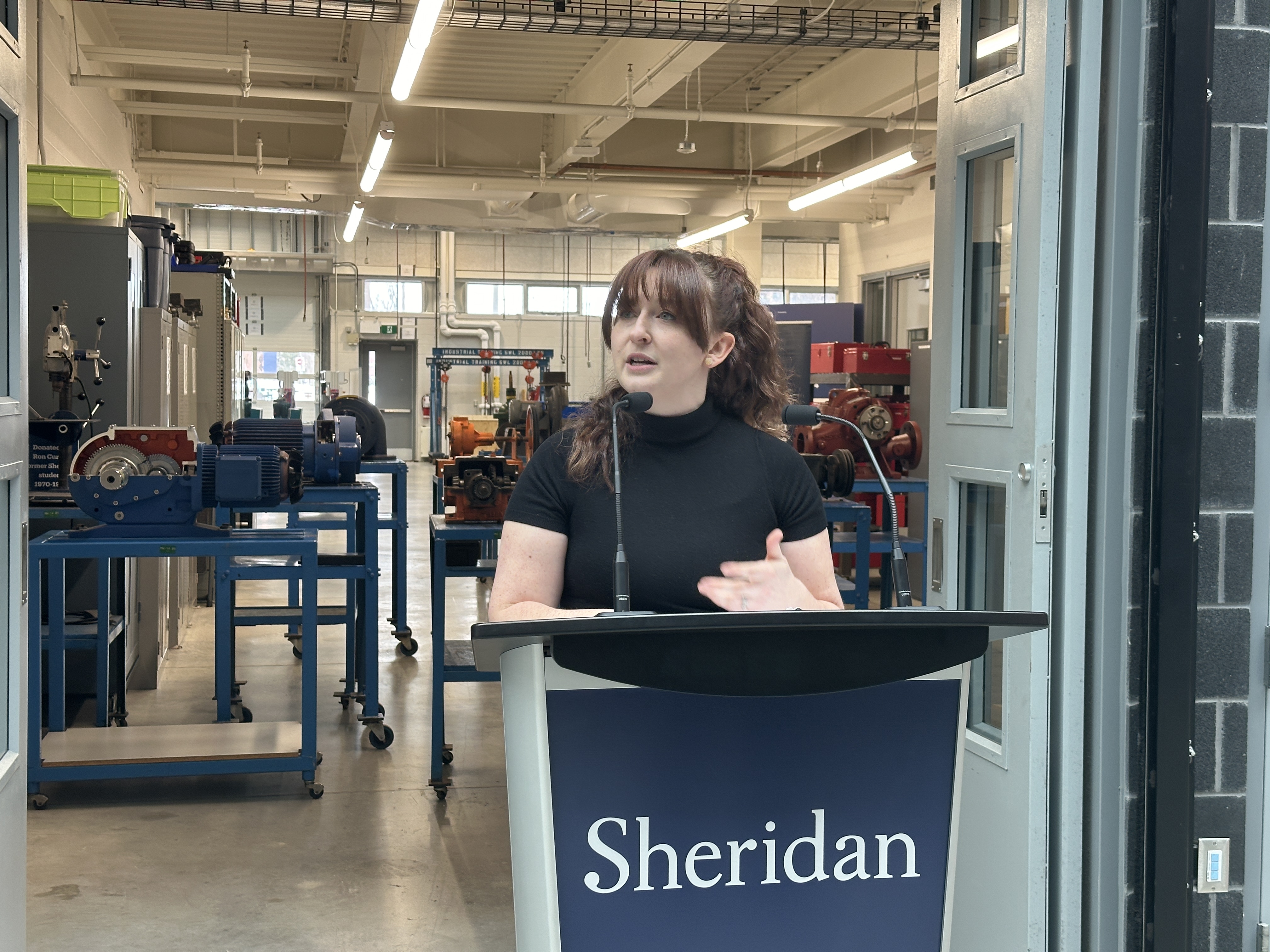 Woman standing at podium