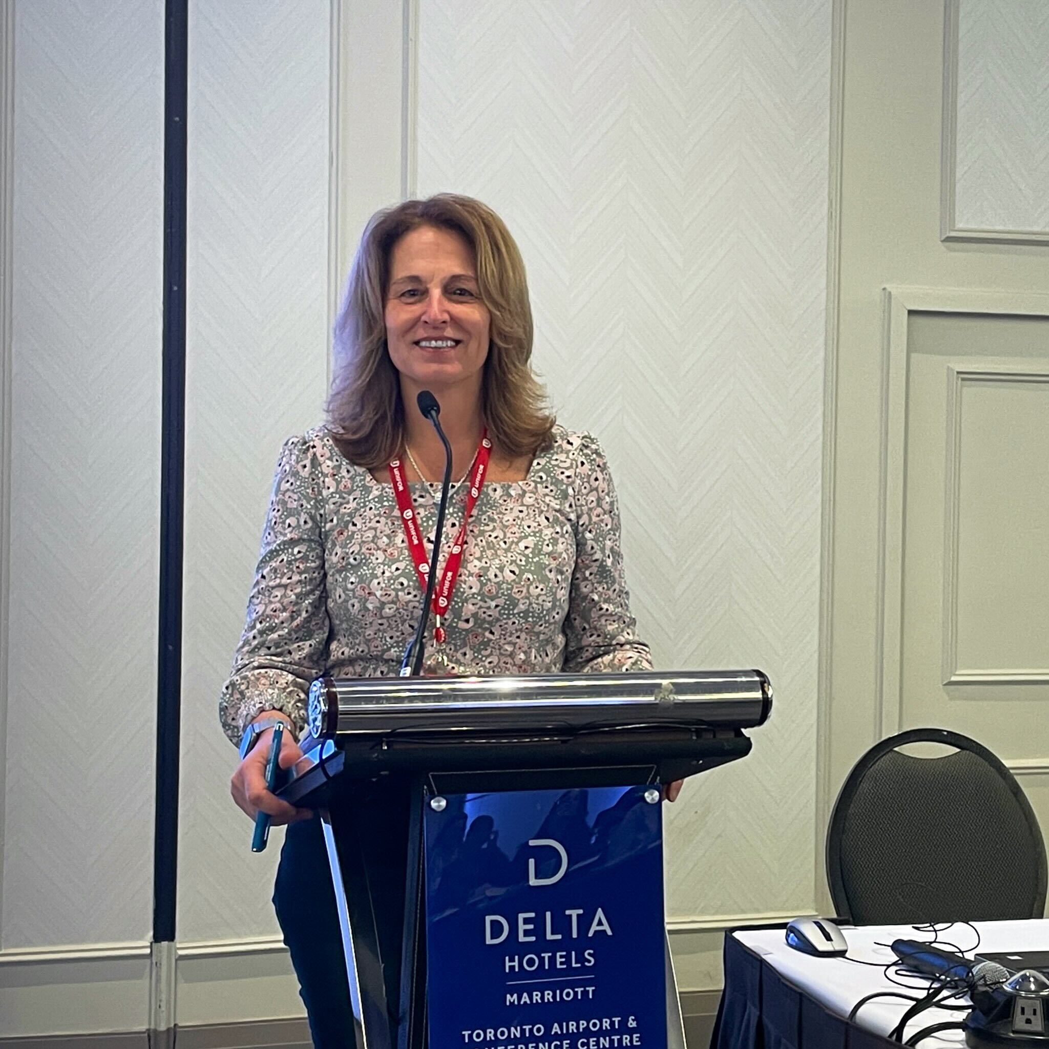 Katha Fortier speaks to delegates