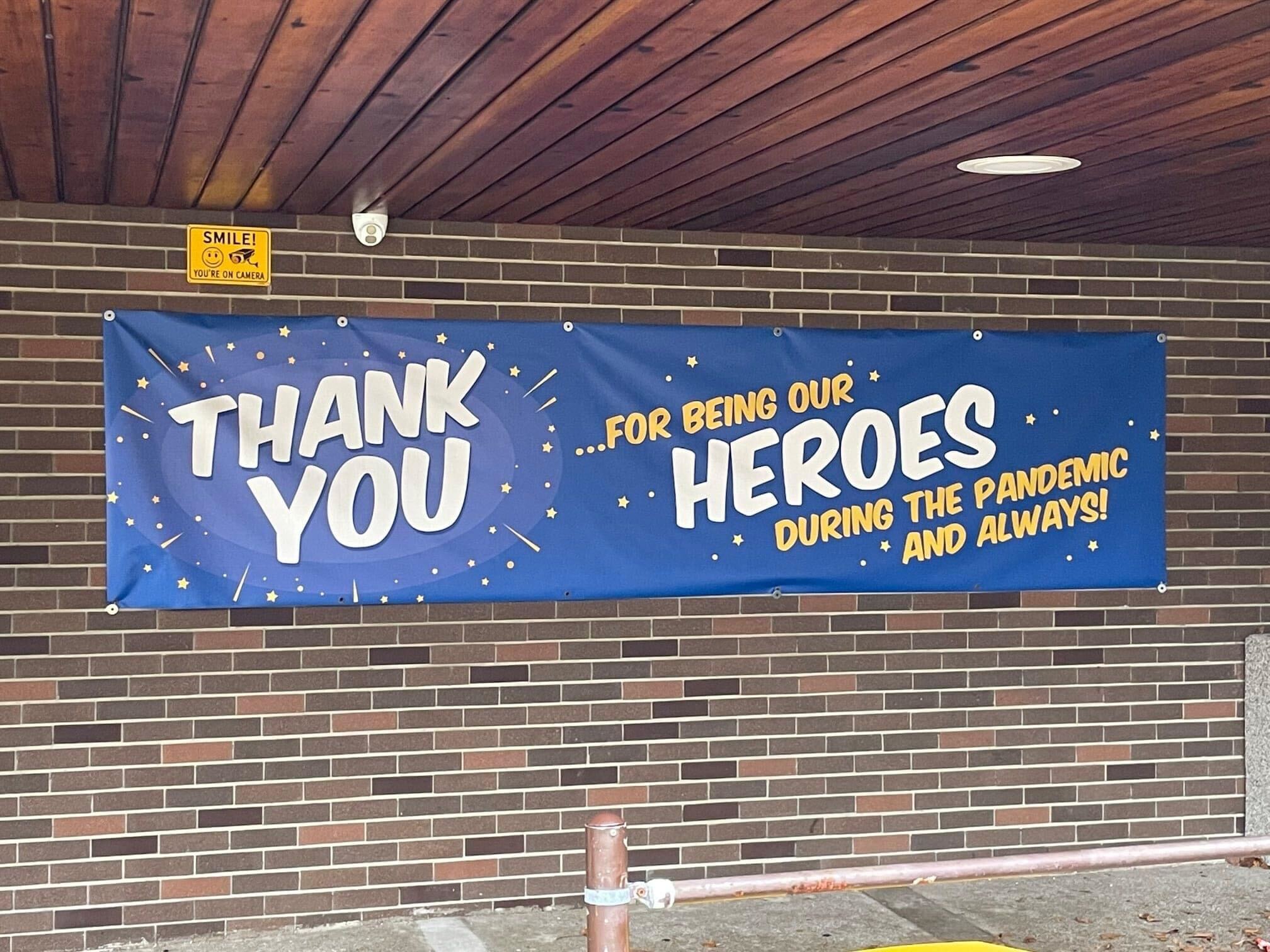 Sign reads thank  you COVID heros 