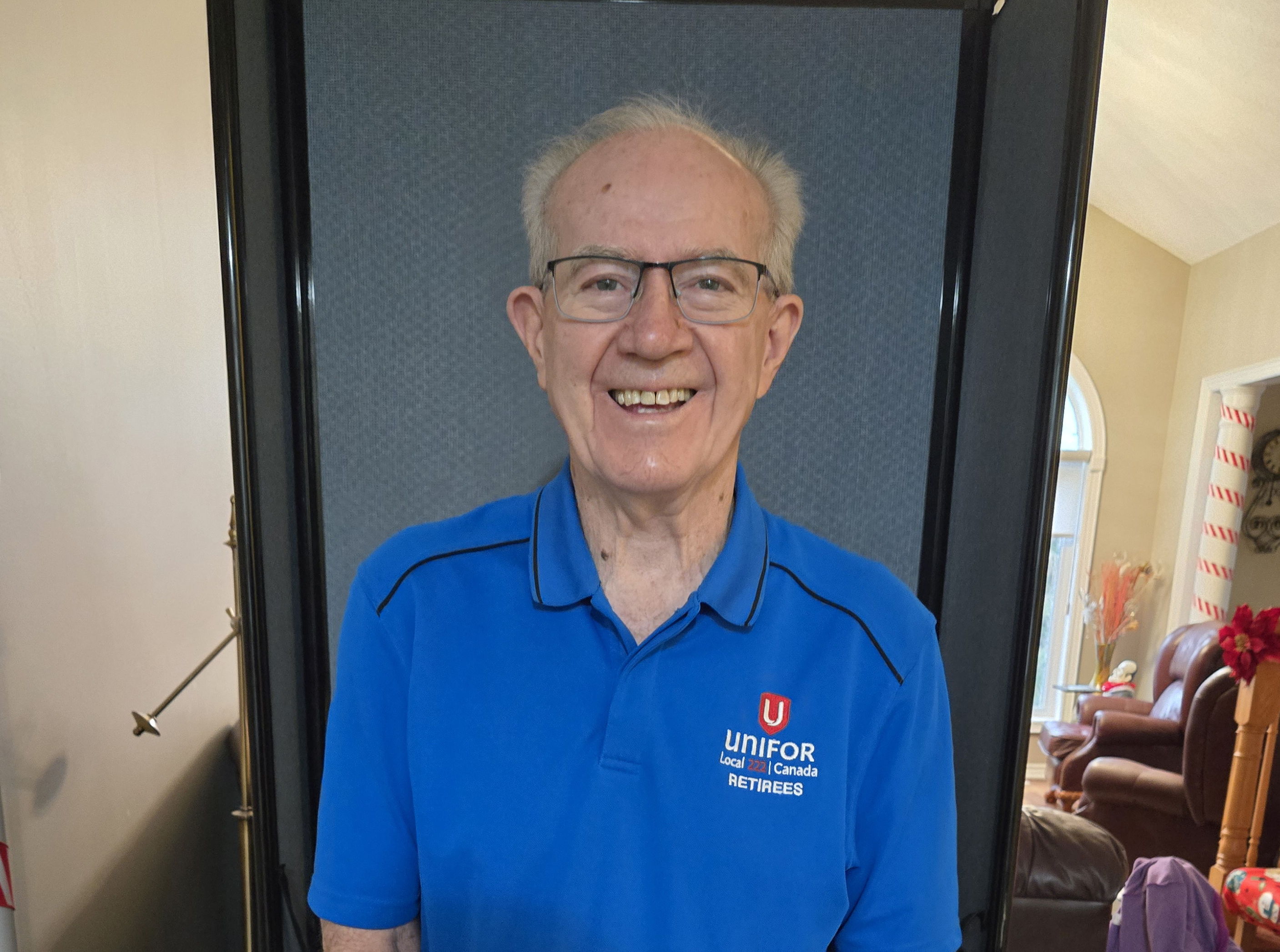 A man wearing a blue shirt.