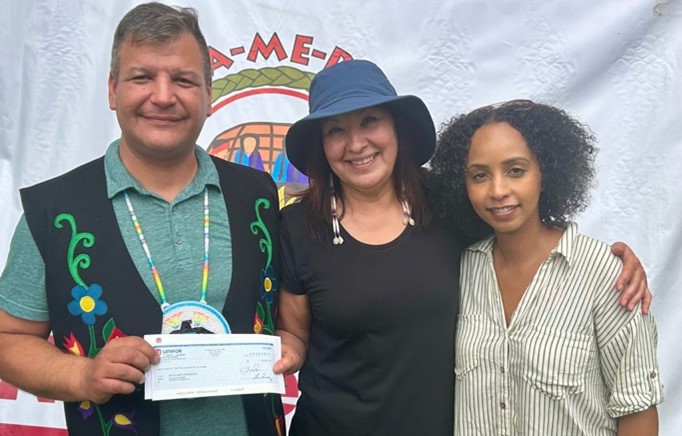 Ontario Regional Director Samia Hashi and Director of Indigenous Relations Gina Smoke presenting a cheque to Na-Me-Res.