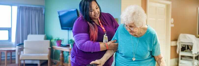 an old women be helped by a personal support worker