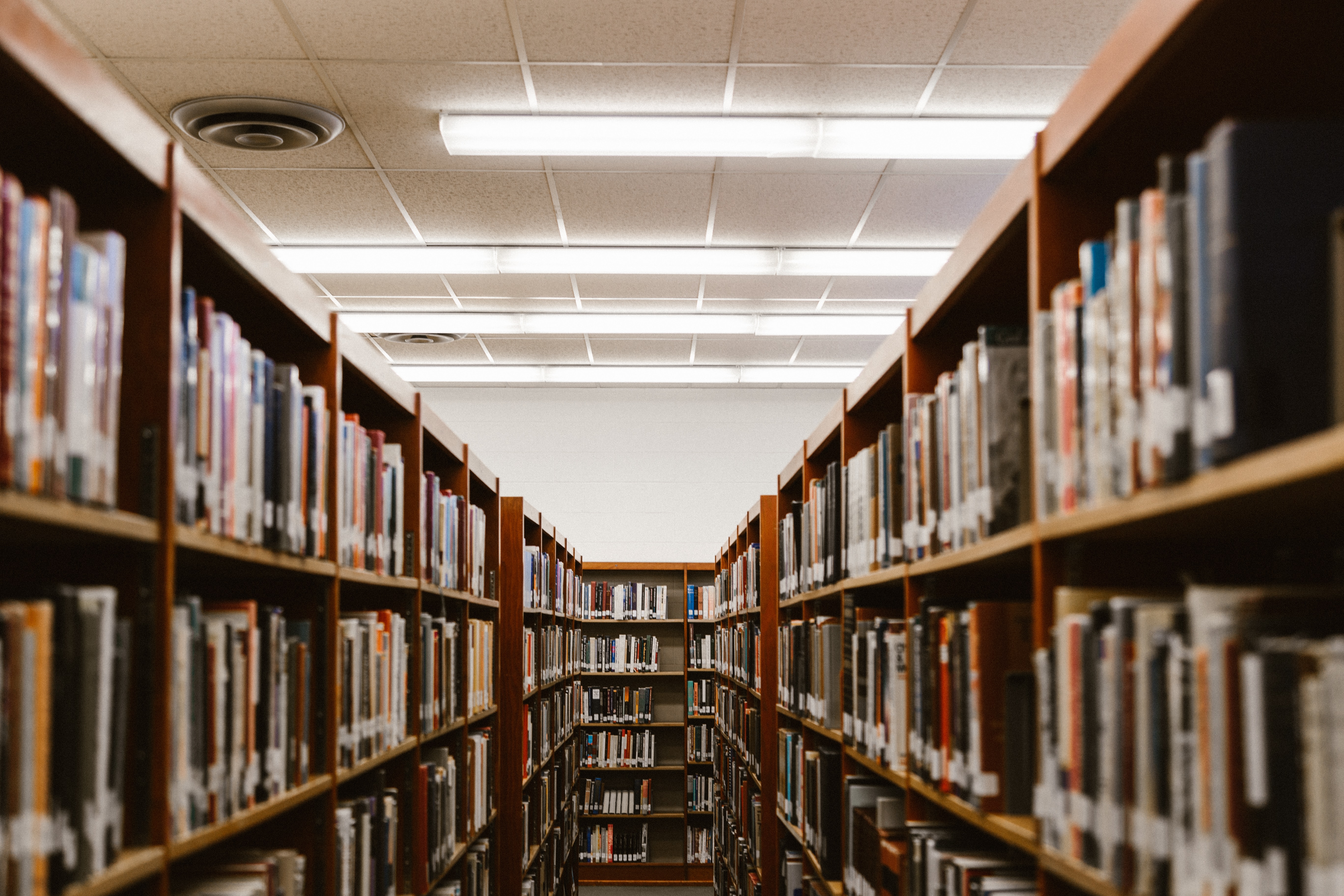 row of book shelves in a library