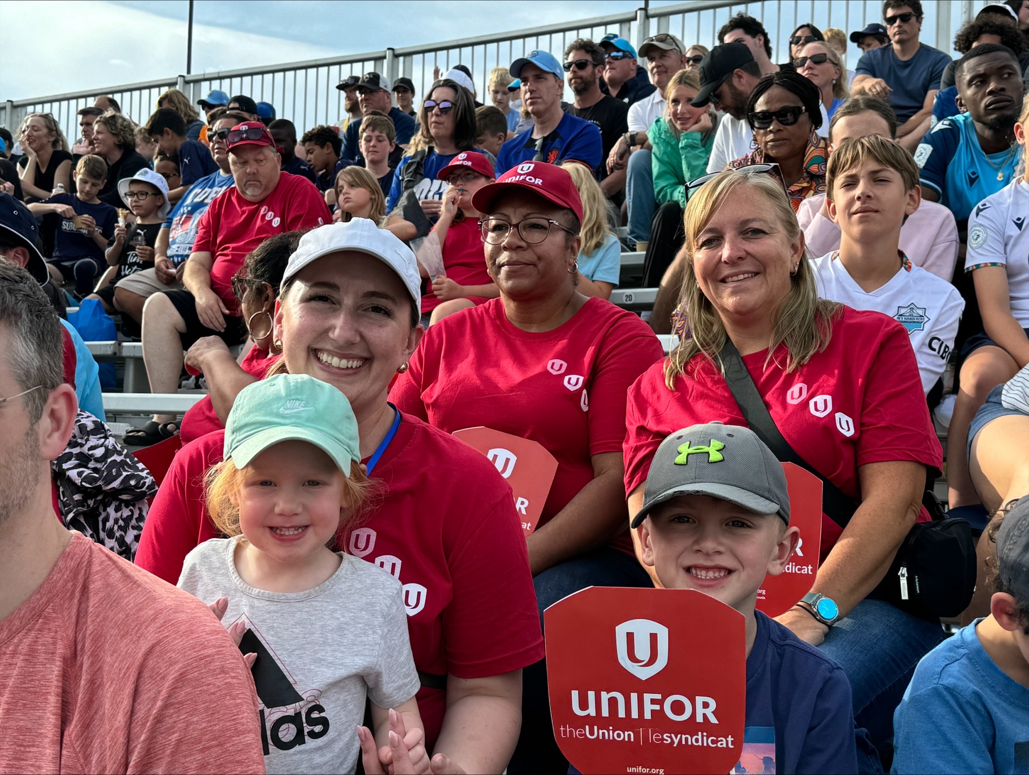 A group of people seated in a stadium