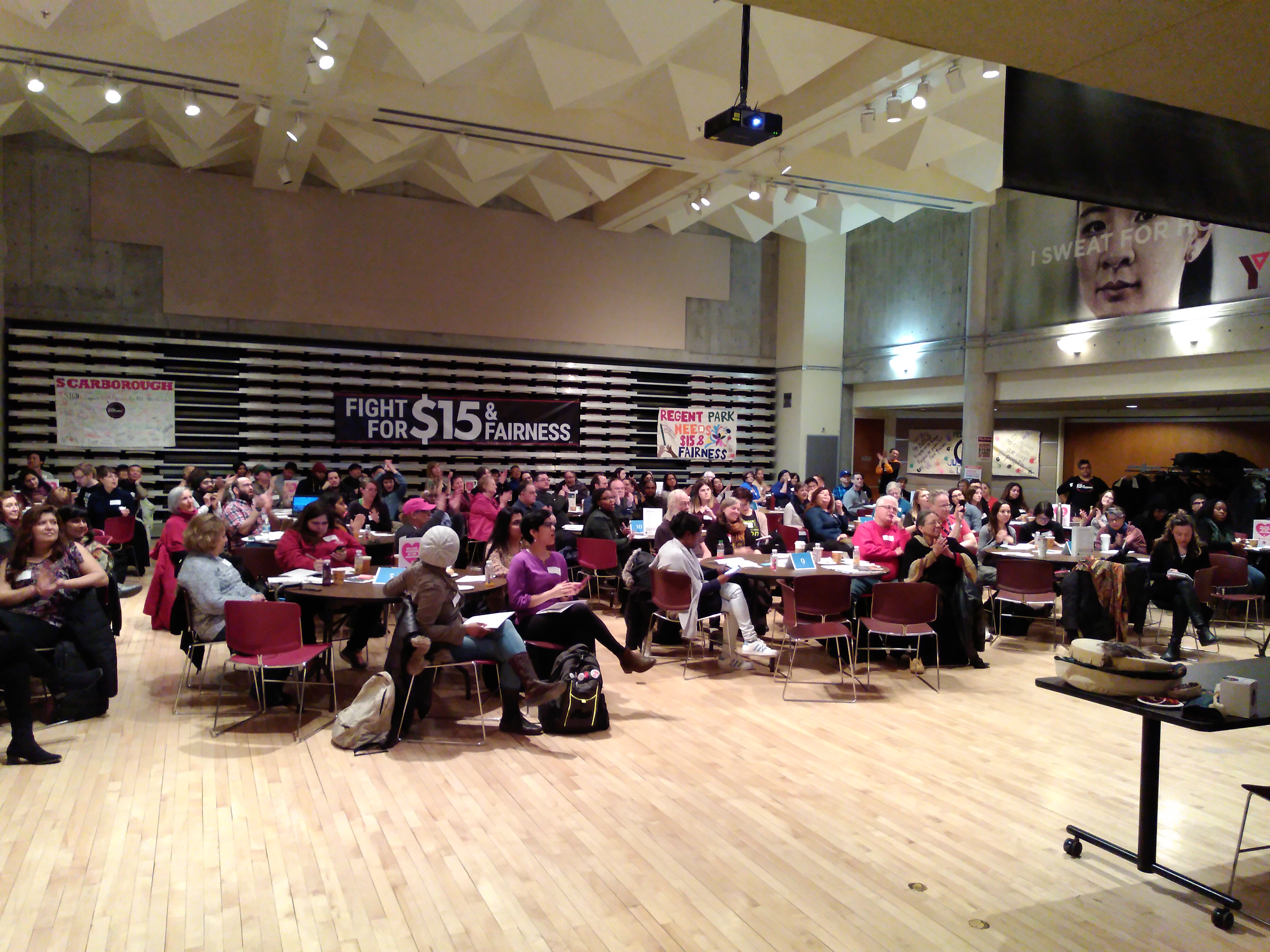 Trade unionists, including Unifor members, attending a meeting on labour reform.