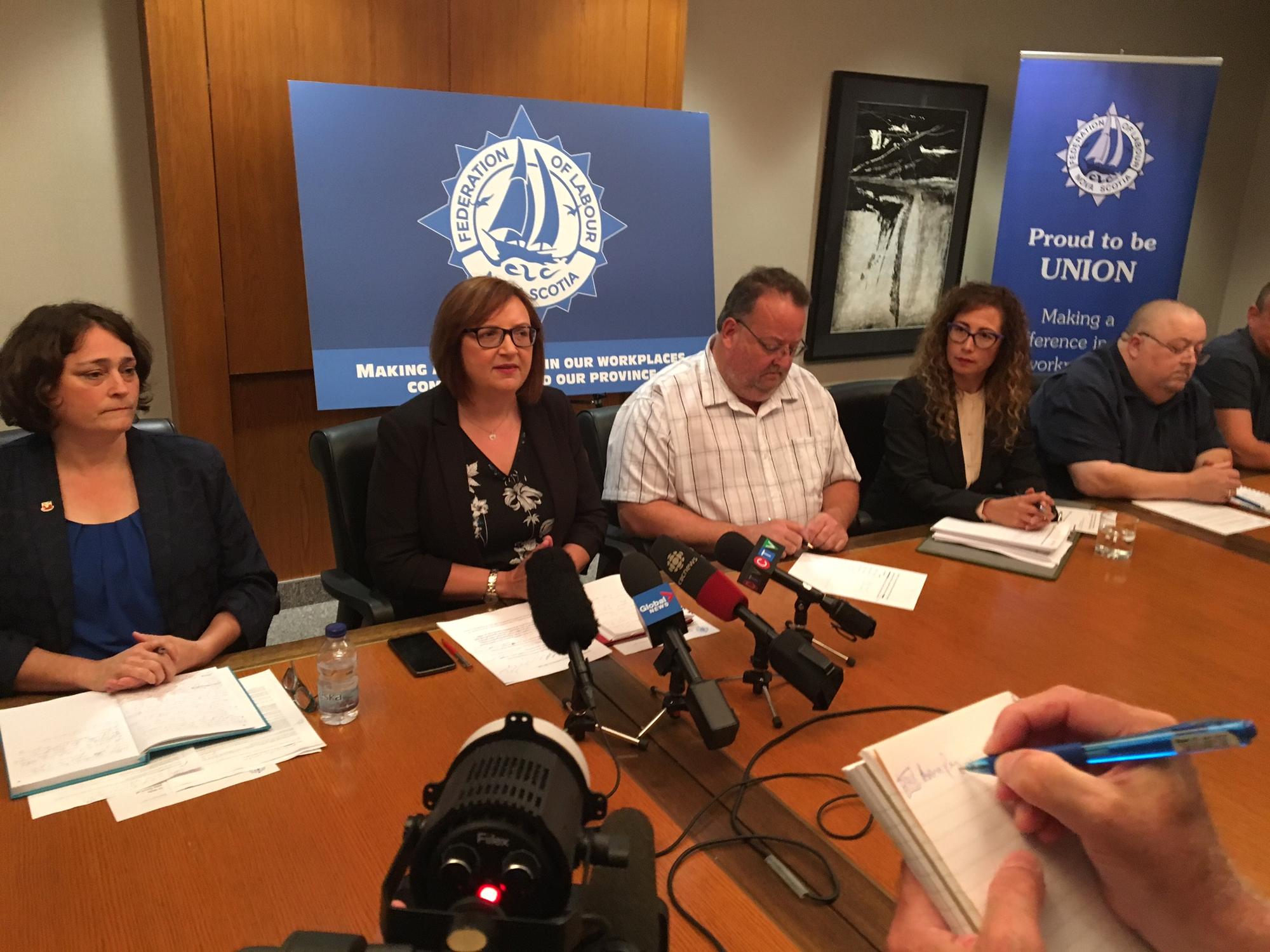 Lana Payne and Danny Cavanagh at a press conference.
