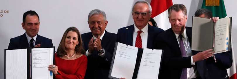 Chrystia Freeland signs CUSMA trade deal with Mexican and US counterparts.