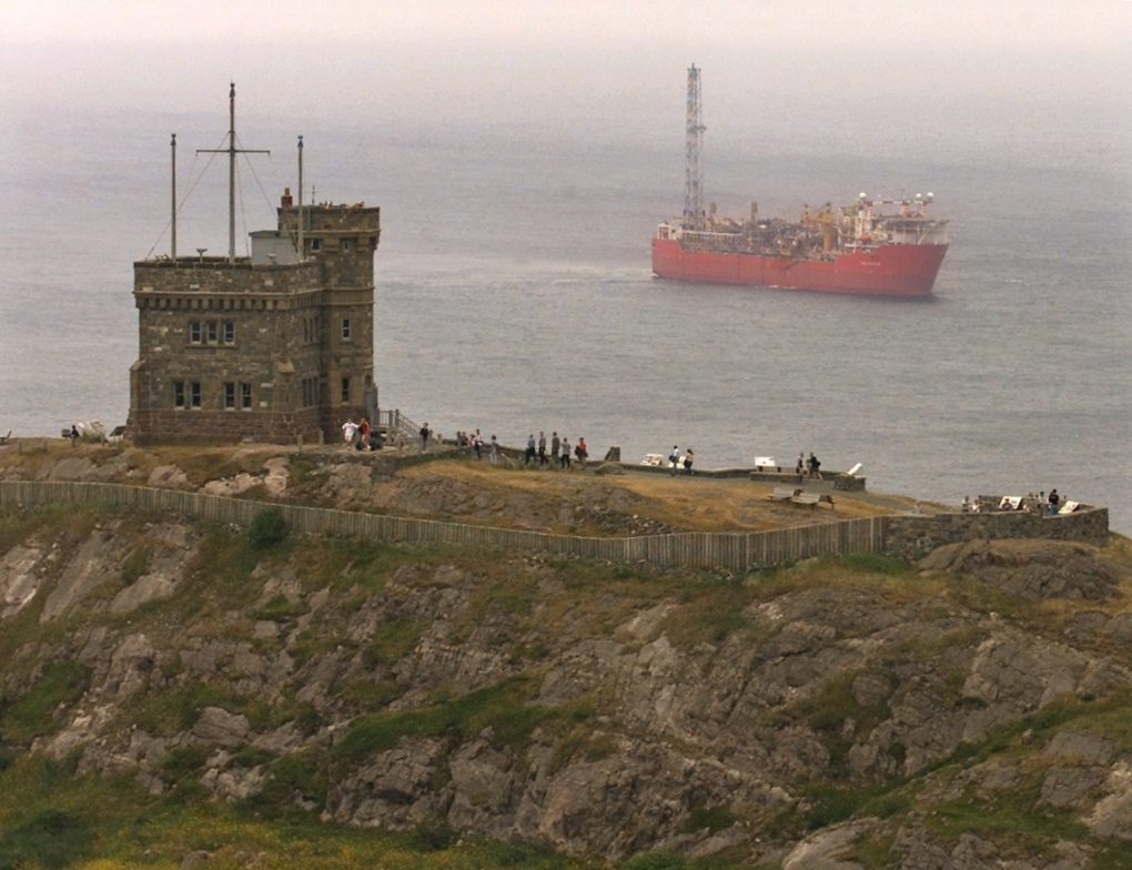 Photo of Terra Nova vessel from a distance with Signal Hill in the foreground