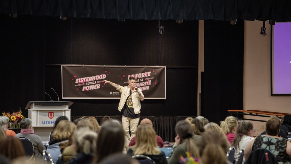 A woman speaking to an audience