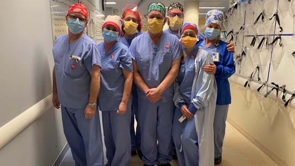 nurses standing together in face masks