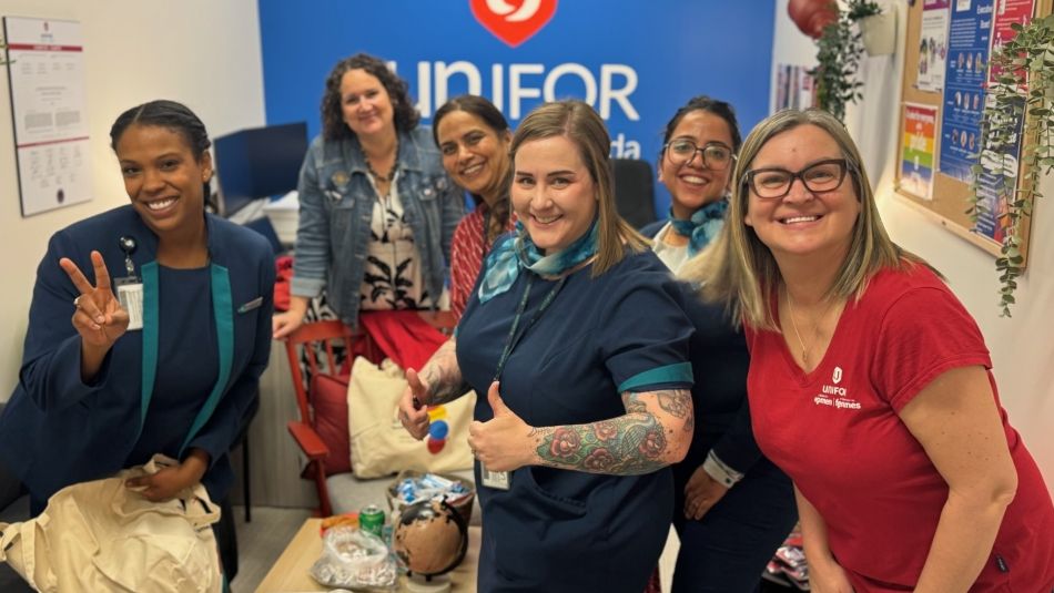 A group of people in a Unifor office