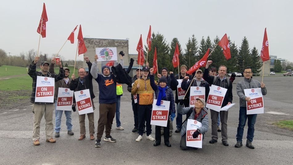 Best Theratronics workers on picket line a group of workers holding on strike signs