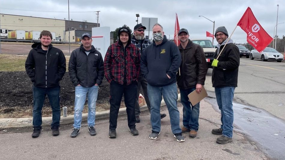 Members on the picket line at Acadia Toyota in Moncton.