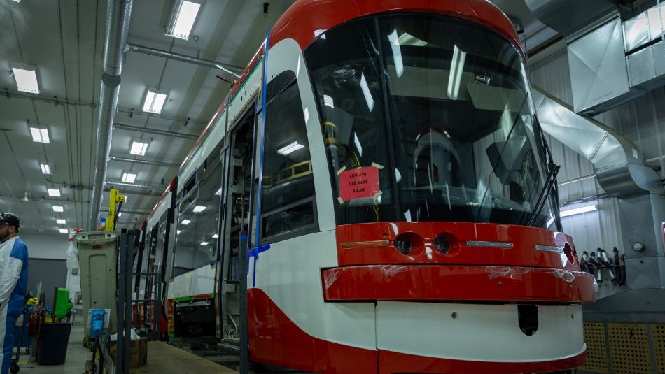shinny red and white transit car