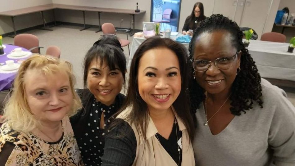 Four Unifor sisters posing for a selfie.