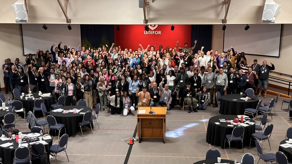 A large group shot of the BIWOC delegates in the conference room at the Unifor Family Education Centre