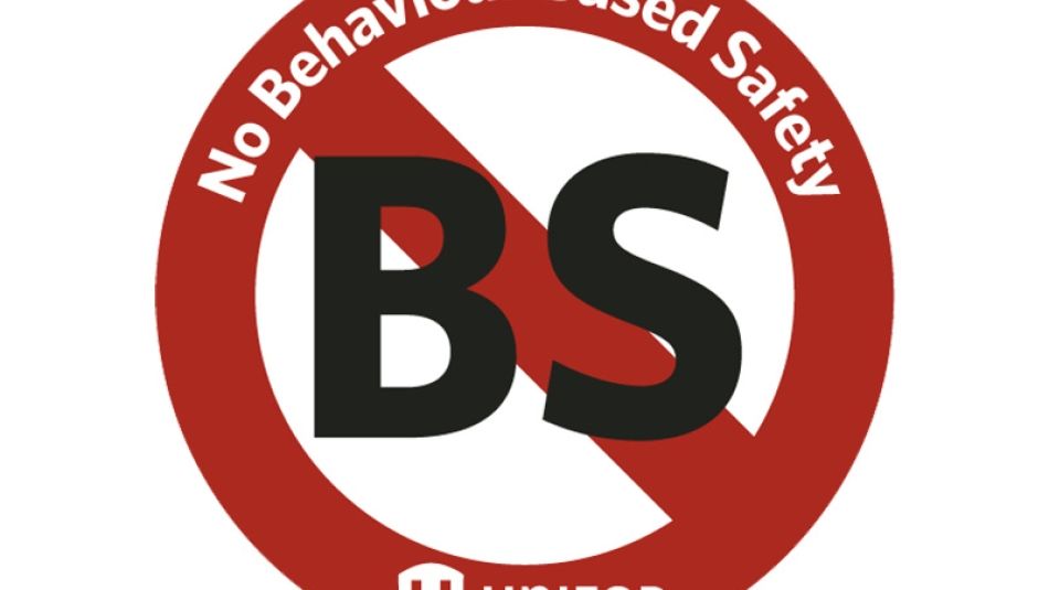 The letters B S in a red circle with a red line across them and text reading "No Behaviour Based Safety" with the Unifor logo at the bottom