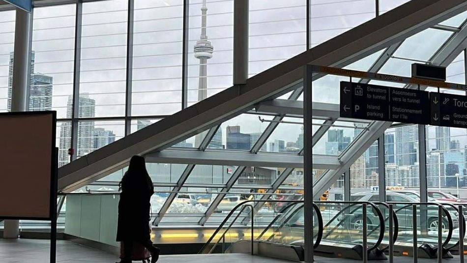 View of the CN Tower from inside Billy Bishop Airport