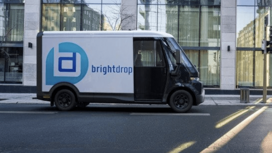 A BrightDrop EV600 electric light commercial vehicle parked on a city street.
