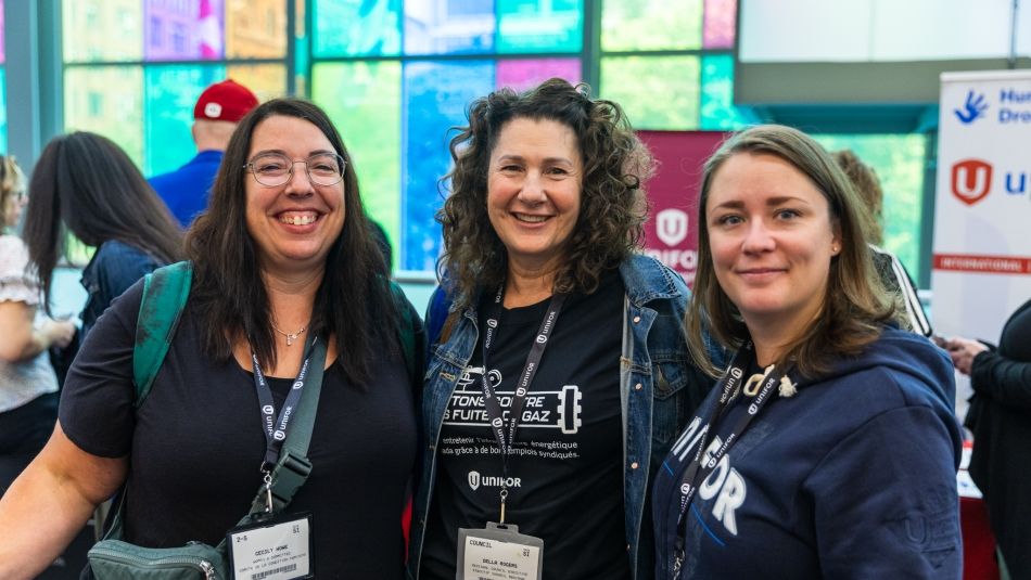Three women smiling at the Montreal confernene centre for Canadian Council 2024