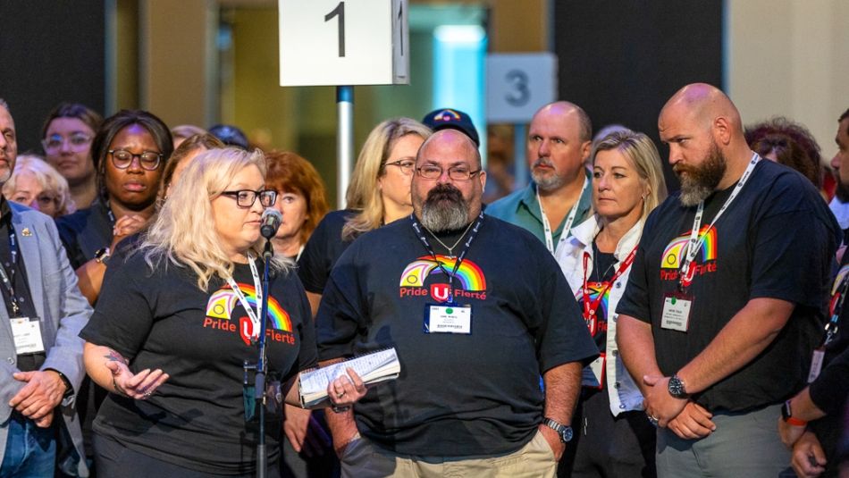 A group of Aviation workers speak at the podium.