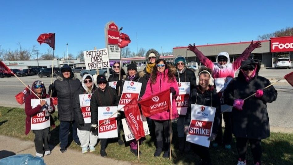 Clear Medical Striking Workers standing together for a group picture