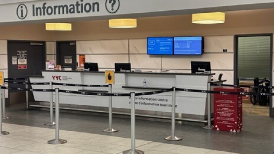 An empty check-in kiosk at the Calgary airport.
