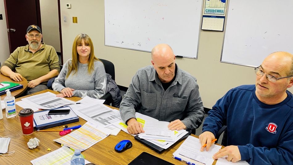 Cottam Diecasting Bargaining Committee members at the bargaining table. 