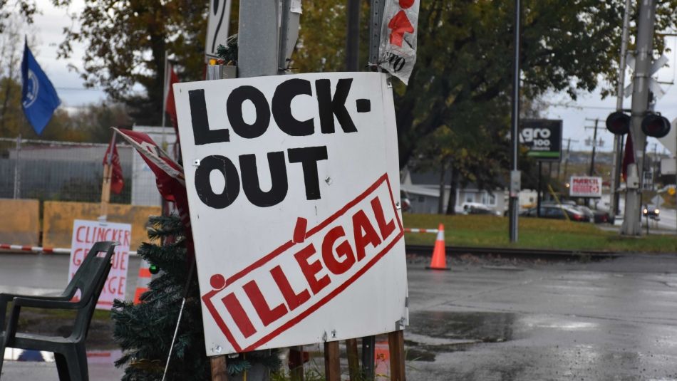 lock-out sign posted on a tree 