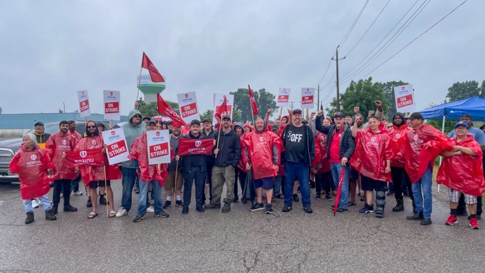 Unifor members standing on the picket line at Dajcor