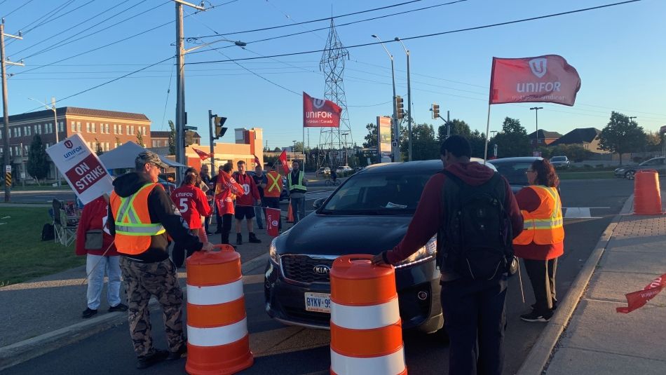 Striking GDI Services workers picket Durham College Oshawa