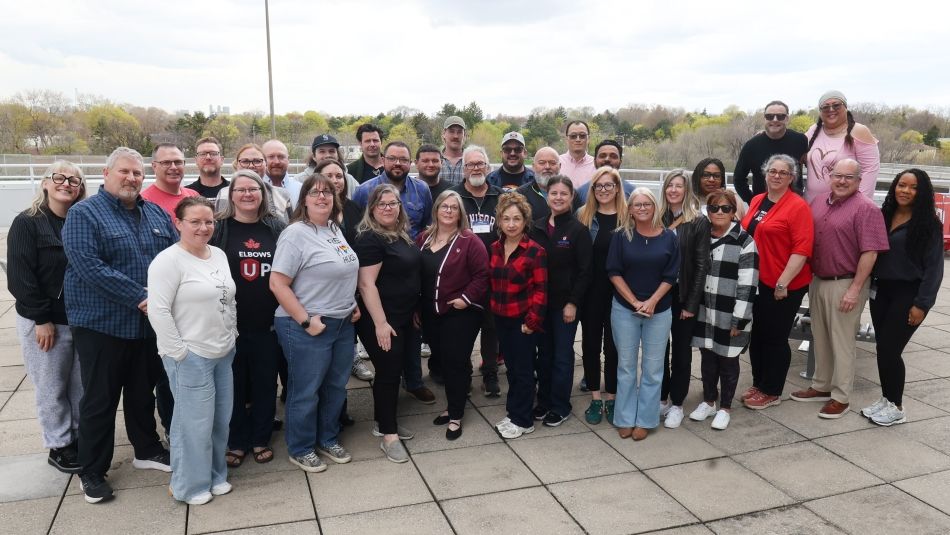 A group photo on a terrace on a cloudy day