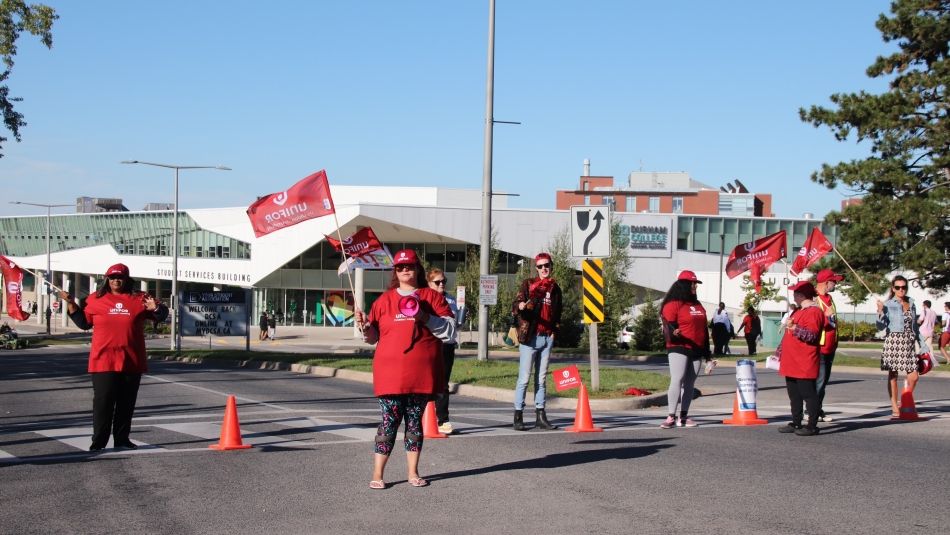 Locked out GDI Services workers standing on the picket line at Durham College Oshawa 