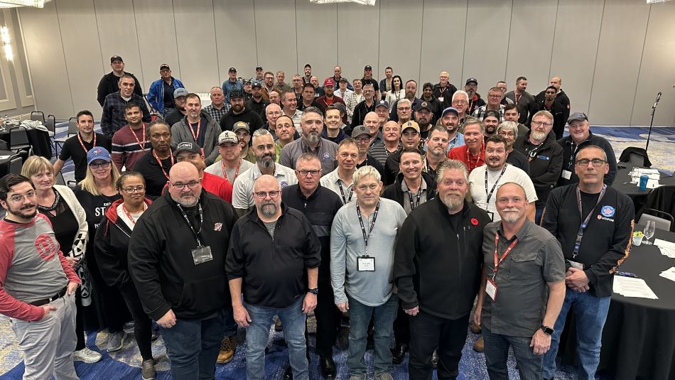 A large group of people gathered for a group photo