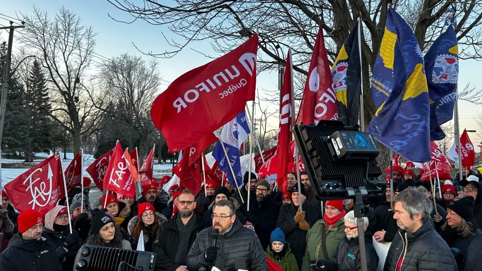 Unifor members rally and speak to media in Montreal