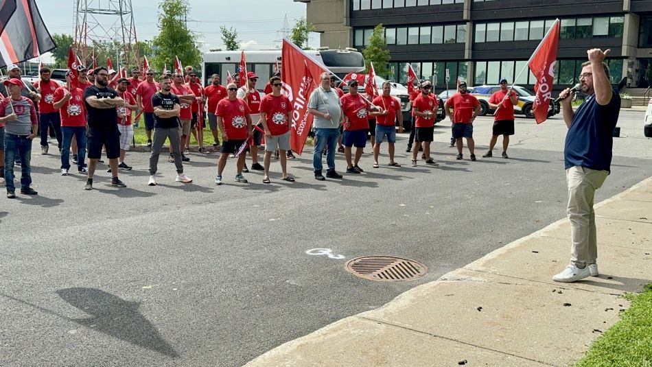 A group of people some holding flags