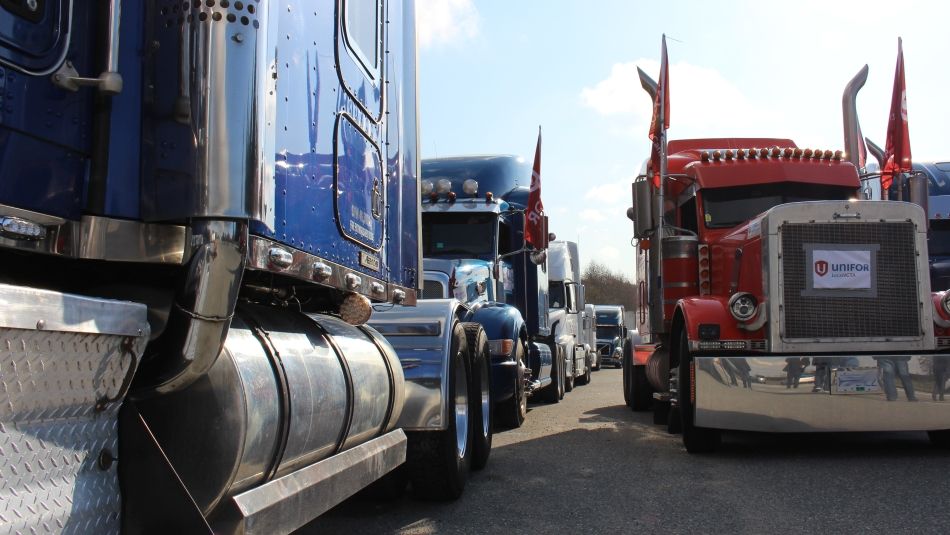 View between two long rows of tractor trailers