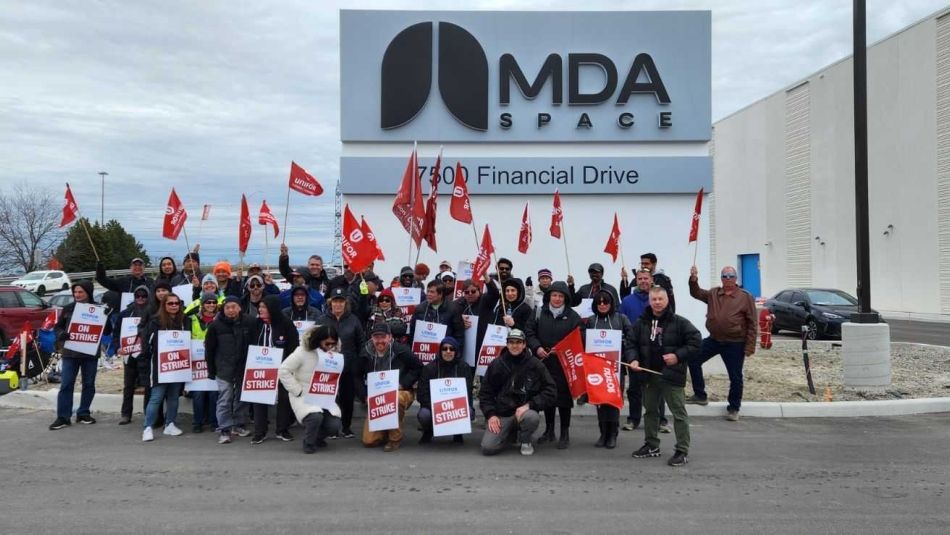 a group of people holding signs