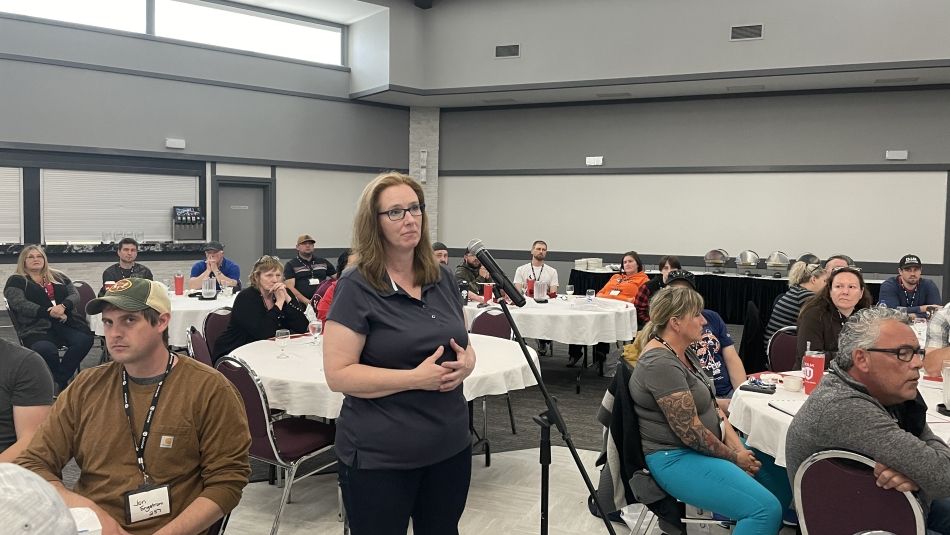 Kerri Jefford, President Local 229 speaking at a floor mic at the Health Care Conference